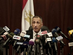 FILE - Egyptian Central Bank Governor Tarek Amer speaks during a press conference at the Central Bank of Egypt in Cairo, Nov. 3, 2016. Amer resigned as the country has struggled to address its financial woes. According to a Wednesday, Aug. 17, 2022 statement from President Abdel Fattah el-Sissi's office, el-Sissi accepted the resignation and named him a presidential adviser. The brief statement offered no reason for Amer's resignation and no replacement was immediately named.