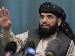 FILE - Suhail Shaheen, Afghan Taliban spokesman speaks during a joint news conference in Moscow, Russia. The Taliban broke its silence Thursday, Aug. 4, 2022, days after a U.S. drone strike killing al-Qaida's top leader in Afghanistan's capital, acknowledging his slaying, and pledging to launch an investigation. Shaheen, the head of the group's political office in Doha, Qatar told the Associated Press in a what's App message that "The government and the leadership weren't aware of what is being claimed, nor any trace there. Islamic Emirate of Afghanistan reiterates its commitment to Doha Agreement." AP Photo/Alexander Zemlianichenko, Pool, File)