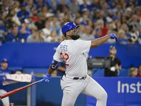 Chicago Cubs right fielder Franmil Reyes (32) hits a home run during fifth inning interleague MLB baseball action against the Toronto Blue Jays, in Toronto on Wednesday, August 31, 2022.