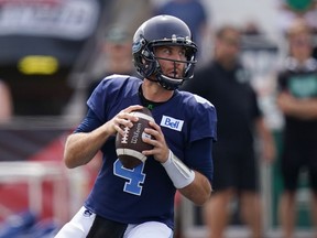 Toronto Argonauts' quarterback McLeod Bethel-Thompson looks to pass during the first half of CFL action against the Saskatchewan Roughriders at Acadia University in Wolfville, N.S., Saturday, July 16, 2022. He has thrown for more yards than Hall of Famer Doug Flutie but Bethel-Thompson doesn't see that as a reason to celebrate.