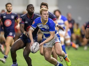 Toronto Arrows centre/wing Mitch Richardson is shown making a pass in a Major League Rugby pre-season game against Old Glory D.C. in Springfield, Va., Jan. 21, 2022. The Arrows have re-signed Richardson, bringing him back for a fifth Major League Rugby season.