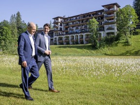Prime Minister Justice Trudeau is hinting that an energy pact planned between Canada and Germany will focus more on Canada's aim to be a long-term clean energy supplier to the world. Prime Minister Justin Trudeau and Olaf Scholz, Chancellor of Germany take a stroll at the G7 Summit in Schloss Elmau on Monday, June 27, 2022.