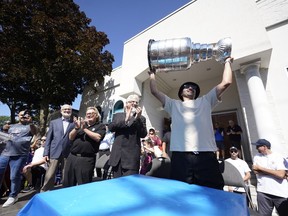 NHL player Nazem Kadri hoist the Stanley Cup in front of the London Muslim Mosque in London, Ontario on Saturday August 27, 2022. Kadri, 31, won the cup for the first time while playing with the Colorado Avalanche.