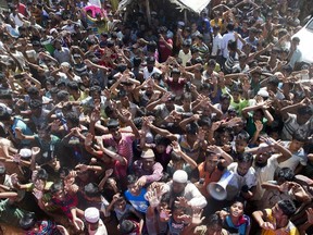 FILE- Rohingya refugees shout slogans during a protest against the repatriation process at Unchiprang refugee camp near Cox's Bazar, in Bangladesh, Nov. 15, 2018. Bangladesh's prime minister Sheikh Hasina on Wednesday, Aug. 17, 2022, told a visiting U.N. official that hundreds of thousands of Rohingya refugees must go back to their ancestral home in Myanmar from crowded camps in neighboring Bangladesh.