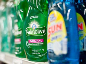 Bottles of Colgate-Palmolive Co. Palmolive brand dishwashing liquid are displayed for sale on a supermarket shelf in Princeton, Illinois, U.S., on Tuesday, July 23, 2013.