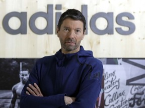 FILE -- CEO of German sports equipment company adidas AG, Kasper Rorsted, poses prior to the annual balance news conference in Herzogenaurach, Germany, Wednesday, March 14, 2018. Sports apparel maker Adidas said Monday that Kasper Rorsted, its CEO since 2016, will step down next year and it has started looking for a successor.