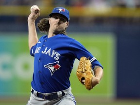 Toronto Blue Jays starting pitcher Kevin Gausman delivers to the Tampa Bay Rays during the first inning of a baseball game Tuesday, Aug. 2, 2022, in St. Petersburg, Fla.&ampnbsp;Gausman has been named the American League player of the week.&ampnbsp;THE CANADIAN PRESS/AP/Chris O'Meara