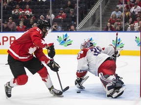 Canada's Mason McTavish (23) scores a goal against Czechia's goalie Tomas Suchanek (30) during second period IIHF World Junior Hockey Championship action in Edmonton on Saturday August 13, 2022.&nbsp;It's win or go home as the quarterfinals begin at the world junior hockey championship in Edmonton.