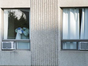 A worker is shown at a seniors residence in Laval, Que., Saturday, Sept. 26, 2020.The health authority for the west of Montreal -- the CIUSSS de l'Ouest-de-l'Île-de-Montréal -- is confirming Streptococcus A outbreak outbreaks at Les Résidences Floralies locations in the Lachine and LaSalle boroughs.