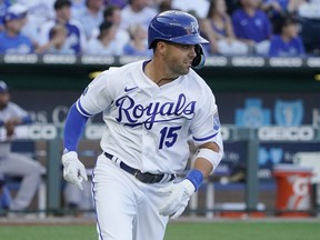 Kansas City Royals' Whit Merrifield runs to first after hitting a two-run double in the third inning against the Tampa Bay Rays during a baseball game Saturday, July 23, 2022, in Kansas City, Mo. The Toronto Blue Jays acquired two-time all-star Whit Merrifield and solidified their bullpen by adding right-handed relievers Anthony Bass and Zach Pop before Tuesday's Major League Baseball trade deadline. The Jays acquired Merrifield just before the 6 p.m. ET deadline from Kansas City for Samad Taylor and Max Castillo. Merrifield was one of 10 Royals who couldn't accompany the team for a four-game series in Toronto last month because he was not vaccinated against COVID-19.