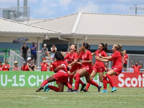Canadian players celebrate after defeating Mexico 6-5 in a penalty shootout in Tampa on Friday, August 5, 2022. Canada will advance to Sunday's final of the CONCACAF Girls' Under-15 Championship against the U.S.