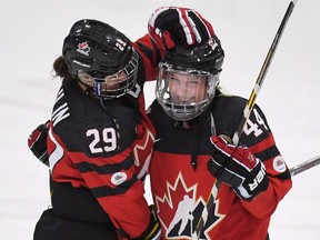 Canada's Marie-Philip Poulin (29) and Sarah Potomak (44) celebrate after defeating Russia in IIHF Ice Hockey Women's World Championship preliminary round action in Plymouth, Mich., on April 3, 2017. Sarah Potomak returns to the Canadian women's hockey team for her first world championship since 2017. The 24-year-old forward from Aldergrove, B.C., says she wasn't sure she'd wear the Maple Leaf again, but Potomak kept faith she could play her way back into the lineup.