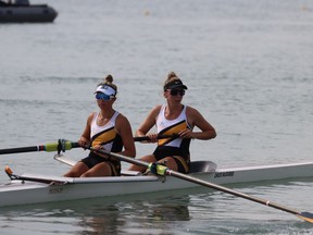 Manitoba's Katie Sierhuis, right, and Leah Miller are shown at the Canada Games in Niagara, Ont., in this Wednesday, August 17, 2022 handout photo. Sierhuis was a promisIng hockey and soccer player before she diagnosed with a rare form of cancer when she was 12. She tried rowing as a fresh start after her recovery.