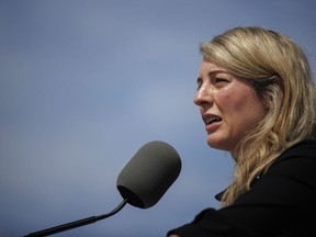 Minister of Foreign Affairs Melanie Joly speaks during a press conference in Toronto on August 5, 2022. Canada has sanctioned a Russian woman whom the foreign affairs minister's office alleges is the architect of a scheme to abduct Ukrainian children and facilitate their adoption into Russian homes.