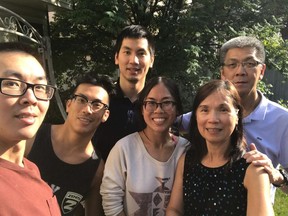 June Cheung, third from right, poses with her family members Gabriel, left to right, Eden, Victor, Lena and Bruce in Edmonton in this 2019 handout photo. A growing number of new immigrants to Canada are bringing with them increasingly diverse languages, setting a record for the number of Canadians whose mother tongue is neither English or French, new 2021 census data reveals. Proficiency in those languages tend to fade after a generation or two though, Statistics Canada's deputy head of the Centre for Demography says. British Columbia speech-language pathologist June Cheung noticed that phenomenon play out in her own Cantonese-speaking family and community when she was growing up in Edmonton.