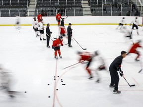 Canada's national junior team players skate during a training camp practice in Calgary, Tuesday, Aug. 2, 2022.THE CANADIAN PRESS/Jeff McIntosh