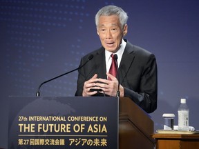 FILE - Singapore Prime Minster Lee Hsien Loong delivers a speech at a session of the International Conference on "The Future of Asia" in Tokyo Thursday, May 26, 2022. Singapore announced it will decriminalize sex between men by repealing a colonial-era law while protecting the city-state's definition of marriage. During his speech Sunday, Aug. 21 at the annual National Day Rally, Prime Minister Lee Hsien Loong said he believed it is the "right thing to do now" as most Singaporeans will now accept it.