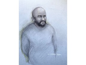 This court artist sketch by Elizabeth Cook shows Aine Leslie Davis, 38, appearing in the dock at Westminster Magistrates' Court, central London, Thursday, Aug. 11, 2022. An alleged member of an Islamic State hostage-taking cell nicknamed "The Beatles" has been charged with terrorism offenses in Britain on Thursday after being deported from Turkey. London police say Aine Davis was arrested at Luton Airport north of London on Wednesday night and charged with offenses under the Terrorism Act.