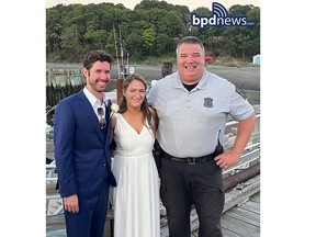 This photo provided by the Boston Police Dept., shows from left, Patrick Mahoney, Hannah (Crawford) Mahoney and Boston police officer Joe Matthews on the dock at Thompson Island in Boston Harbor on Saturday, Aug. 13, 2022. Patrick Mahoney was scheduled to get married on Thompson Island, but the boat that was supposed to ferry him to the island where his bride-to-be was waiting broke down. Officer Matthews transported the groom and his party to the island on his police boat so Mahoney's marriage to Hannah Crawford could go on as scheduled.(Boston Police Dept. via AP)
