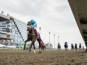 Jockey Rafael Hernandez, aboard Moira, races on their way to winning the 163rd running of the $1-million Queen's Plate in Toronto on Sunday, August 21, 2022.