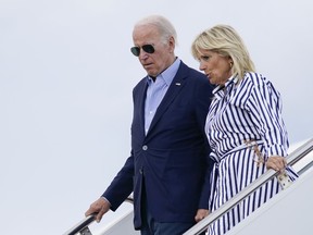 President Joe Biden and first lady Jill Biden arrive at Andrews Air Force Base after spending the day in Kentucky touring areas impacted by floods, Monday, Aug. 8, 2022, at Andrews Air Force Base, Md.