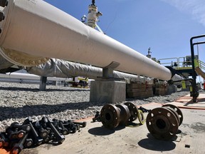 FILE - Nuts, bolts and fittings are ready to be added to the east leg of the pipeline near St. Ignace, Mich., as Enbridge Inc., prepares to test the east and west sides of the Line 5 pipeline under the Straits of Mackinac in Mackinaw City, Mich., June 8, 2017. A federal judge Thursday, Aug. 18, 2022, kept jurisdiction over a lawsuit seeking to close the oil pipeline crossing a section of the Great Lakes, rejecting Michigan's effort to shift the case to state court.