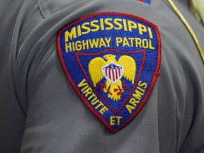 The shoulder patch of a Mississippi Highway Patrol officer is photographed during a ceremony in Jackson, Miss., May 17, 2022. An incident involving a white Mississippi Highway Patrol officer and three Black men is under investigation after a viral video showed the officer putting a handcuffed man into a chokehold and wrestling him into a ditch, Friday, Aug. 5, 2022, in McComb, Miss.