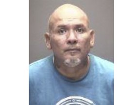 This booking photo provided by the Galveston Police Department on Sunday, Aug. 7, 2022, shows Miguel Espinoza. Four people riding in a golf cart were killed -- including two juveniles -- when an allegedly intoxicated man driving an SUV ran a stop sign at an intersection in Southeast Texas, police said. Espinoza, 45, has been charged with four counts of intoxication manslaughter in the Saturday crash. (Galveston Police Department via AP)
