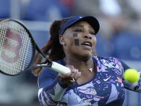 FILE - Serena Williams returns the ball during her quarterfinal doubles tennis match with Ons Jabeur of Tunisia against Shuko Aoyama of Japan and Hao-Ching of Taiwan at the Eastbourne International tennis tournament in Eastbourne, England, Wednesday, June 22, 2022. The U.S. Open draw on Thursday, Aug. 25, 2022, set up 23-time Grand Slam champion Williams to face Danka Kovinic of Montenegro in the first round. The tournament begins Monday.