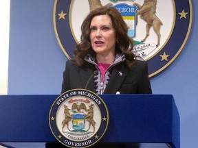 FILE - Michigan Gov. Gretchen Whitmer speaks at a news conference on March 11, 2022, at the governor's office in Lansing, Mich. Two men accused of crafting a plan to kidnap Whitmer in 2020 and ignite a national rebellion are facing a second trial with jury selection starting Tuesday, Aug. 9, 2022, months after a jury couldn't reach a verdict on the pair while acquitting two others in the case.