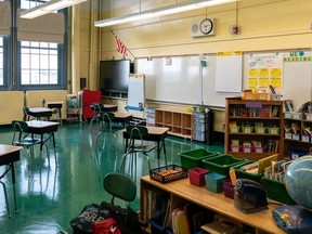 Students' desk adhere to social distancing requirements in a classroom at a public elementary school in the Brooklyn borough of New York.