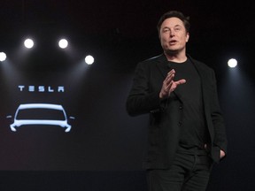 FILE - Tesla CEO Elon Musk speaks before unveiling the Model Y at the company's design studio on March 14, 2019, in Hawthorne, Calif. Musk is selling about 8 million Tesla shares worth nearly $7 billion as the billionaire looks to get his finances in order ahead of his court battle with Twitter.
