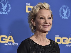 FILE - Anne Heche arrives at the 74th annual Directors Guild of America Awards on March 12, 2022, in Beverly Hills, Calif. A spokesperson for Heche says the actor is on life support after suffering a brain injury in a fiery crash a week ago and isn't expected to survive. The statement released on behalf of her family said she is being kept on life support to determine if she is a viable organ donor.
