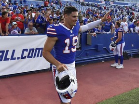 FILE - Buffalo Bills punter Matt Araiza waves to fans after a preseason NFL football game against the Indianapolis Colts in Orchard Park, N.Y., Saturday, Aug. 13, 2022. With a nickname like "Punt God," Matt Araiza has all but assured himself to securing a spot on the Buffalo Bills roster. The Bills cleared the way for the rookie sixth-round pick out of San Diego State to take over the punting duties this season after releasing returning veteran Matt Haack on Monday, Aug. 22, 2022.
