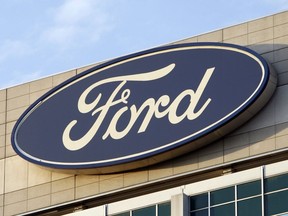 In this Oct. 26, 2009 photo, the Ford logo is seen on the automaker's headquarters in Dearborn, Mich. A Georgia jury has returned a $1.7 billion verdict against Ford Motor Co. involving a pickup truck crash that claimed the lives of a Georgia couple. Lawyers for the couple confirmed the verdict. Jurors in Gwinnett County returned the verdict late last week in the civil case involving what the plaintiffs' lawyers called dangerously defective roofs on Ford pickup trucks. Melvin and Voncile Hill were killed in April 2014 in the rollover wreck of their 2002 Ford F-250 pickup truck. Ford representatives did not immediately respond to requests for comment Sunday, Aug. 21, 2022.