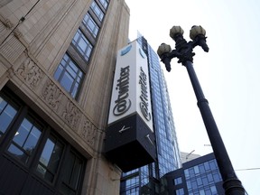 FILE - A sign is pictured outside the Twitter headquarters in San Francisco, Monday, April 25, 2022. A former Twitter employee has been convicted of failing to register as an agent for Saudi Arabia and other charges after accessing private data on users critical of the kingdom's government in a spy case that spanned from Silicon Valley to the Middle East.
