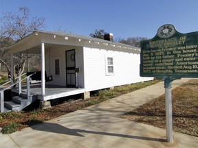 FILE - A historical marker is pictured on Dec. 10, 2009, that denotes the childhood home of Elvis Presley in Tupelo, Miss., where fans can catch a glimpse of the rocker's early years. In August 2022, the Elvis Presley Birthplace and Museum was seeing an uptick in tourism because of the 45th anniversary of Presley's death.