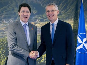 Prime Minister Justin Trudeau meets with NATO Secretary-General Jens Stoltenberg at the NATO Summit in Madrid on Wednesday, June 29, 2022.