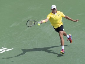 Tommy Paul of the United States returns to Carlos Alcaraz of Spain during second round of play at the National Bank Open tennis tournament Wednesday August 10, 2022 in Montreal.