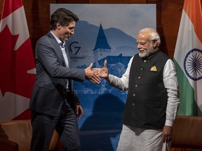 Prime Minister Justin Trudeau and Indian Prime Minister Narendra Modi shake hands prior to a bilateral meeting at the G7 Summit in Schloss Elmau, in Germany on Monday, June 27, 2022.