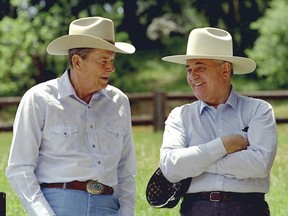 FILE - Former President Ronald Reagan, left, and former Soviet President Mikhail Gorbachev don cowboy hats while enjoying a moment at Reagan's Rancho del Cielo north of Santa Barbara, Calif, on May 2, 1992. Russian news agencies are reporting that former Soviet President Mikhail Gorbachev has died at 91. The Tass, RIA Novosti and Interfax news agencies cited the Central Clinical Hospital.