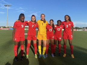 Canada U-15 girls' soccer team members (left to right) Annabelle Chukwu, Nikolina Istocki, Noelle Henning, Bianca Hanisch, Isabelle Chukwu and Mya Angus pose for a photo at the CONCACAF Girls' Under-15 Championship in Tampa, Fla. on Monday, Aug.1, 2022. Annabelle Chukwu scored on an assist from twin sister Isabelle on Tuesday as Canada downed Puerto Rico 4-1 at the championship.THE CANADIAN PRESS/HO-Canada Soccer **MANDATORY CREDIT**