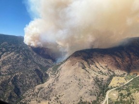 The southwest corner of the Keremeos Creek wildfire is shown in a July 31, 2022 handout photo. THE CANADIAN PRESS/HO-BC Wildfire Service **MANDATORY CREDIT**