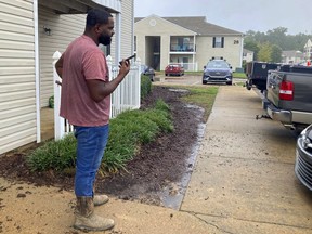Tony Banks, 35, stands outside his apartment in Flowood, Miss., on Thursday, Aug. 25, 2022. His apartment complex, the Laurel Park Apartments, flooded Wednesday as a water overflowed from a nearby creek.