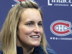 Canadian Hockey Olympian Marie-Philip Poulin speaks to the media during a news conference, Tuesday, June 7, 2022 in Brossard, Que.