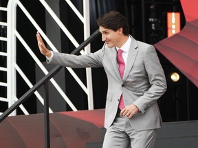 Prime Minister Justin Trudeau waves to the crowd after delivering a speech during Canada Day celebrations at LeBreton Flats in Ottawa on Friday, July 1, 2022. Trudeau is resuming his summer politicking tour today with a trip to Quebec's Gaspé Peninsula.