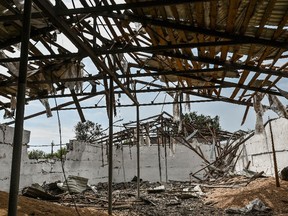 Wheat grains are seen inside a storage damaged by a Russian missile strike, as Russia’s attack on Ukraine continues, in Zaporizhzhia Region, Ukraine Aug. 5.