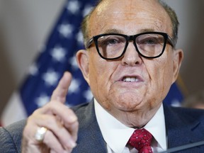 FILE - Former New York Mayor Rudy Giuliani, a lawyer for President Donald Trump, speaks during a news conference at the Republican National Committee headquarters, Nov. 19, 2020, in Washington. A lawyer for Giuliani says he will not appear as scheduled Tuesday, Aug. 9, 2022, before a special grand jury in Atlanta that's investigating whether former President Donald Trump and others illegally tried to interfere in the 2020 general election in Georgia.