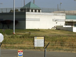 FILE - The Federal Correctional Institution is shown in Dublin, Calif., July 20, 2006. The former warden of the California women's prison, who is already facing federal charges alleging he sexually abused inmates, was charged Tuesday, Aug. 23, 2022, with sexually abusing two other female prisoners. The Justice Department handed down the additional charges against Ray Garcia, 55, who worked as the warden at the Federal Correctional Institution in Dublin.