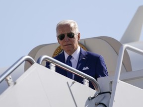 President Joe Biden arrives on Air Force One at Andrews Air Force Base, Md., Monday, Aug. 29, 2022, en route to Washington. Biden will push for a new ban on assault-style weapons when he talks about his crime prevention plans in Wilkes-Barre, Pa., on Tuesday.